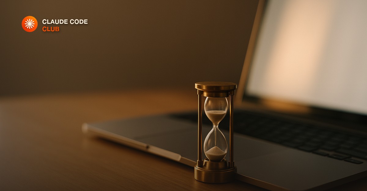 A minimalist workspace with a laptop showing branching timeline lines on screen, a small hourglass, and a notebook with a bent-back page corner