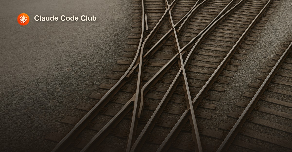 A railway junction where a single track splits into several diverging and rejoining lines, representing Git branches and merges